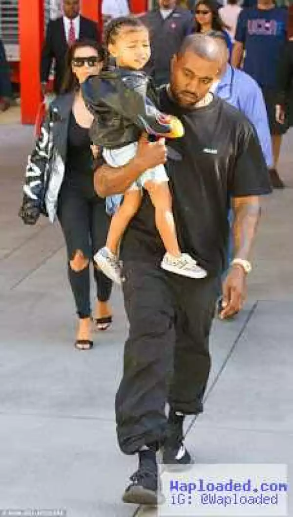 Kanye West and Kim Kardashian take the kids on family day out